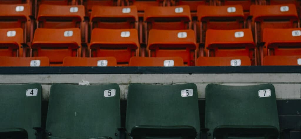 empty stadium seats at the JP4 Foundation baseball stadium in Vadnais Heights, MN