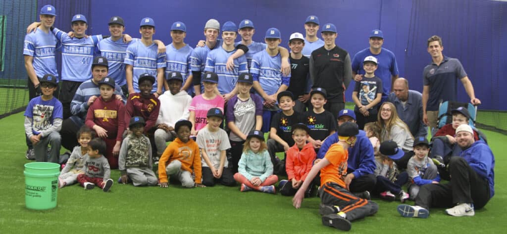 group photo at a JP4 baseball clinic