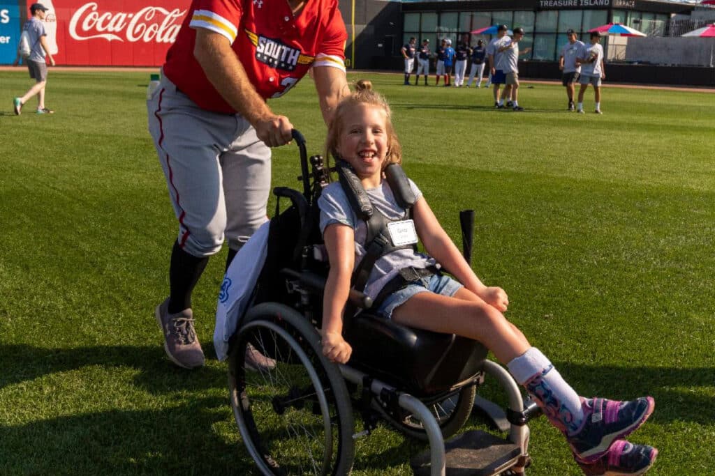Child in a wheelchair on CHS field
