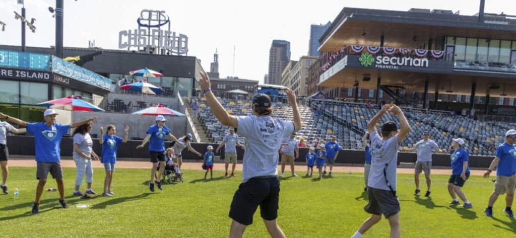 People stretching on CHS field